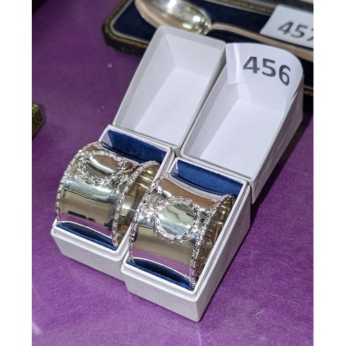 456 - 2 x hallmarked silver napkin rings in original boxes