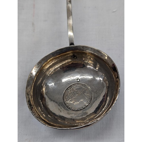 383 - Silver toddy ladle with coin to base