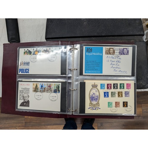 85 - Approximately 57 1st day cover UK stamps from 1959, 60's, 70's and 80's in folder - all proceeds fro... 