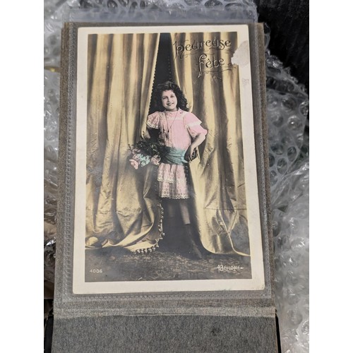 43 - Vintage snapshots album of mixed hand coloured early 1900's postcards including some French