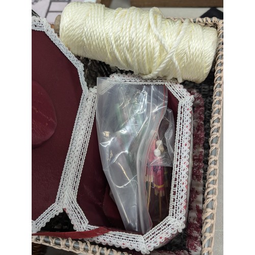 78 - Wicker basket of assorted Crafting/needlework items including floor stand tapestry frame