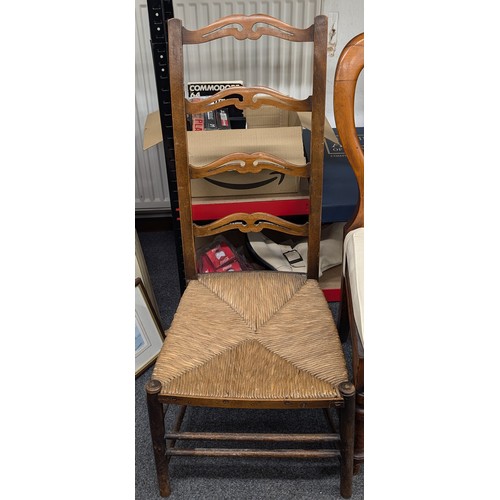 211 - 2 x old carved wooden chairs, 1 upholstered and cushioned seat and 1 rush seated