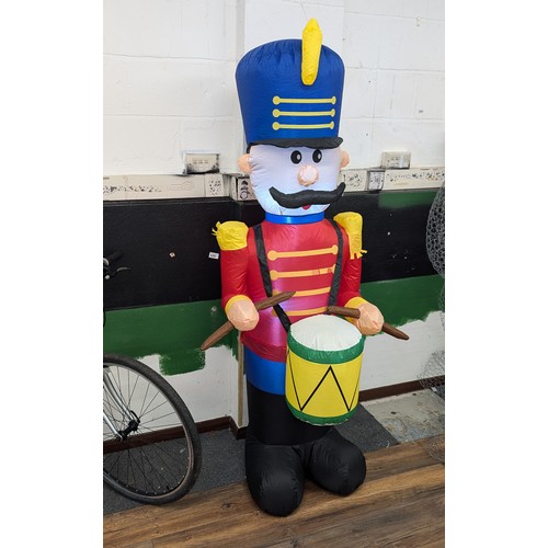 3 - Approximately 6 ft tall clear static light up, indoor or outdoor inflatable little drummer boy