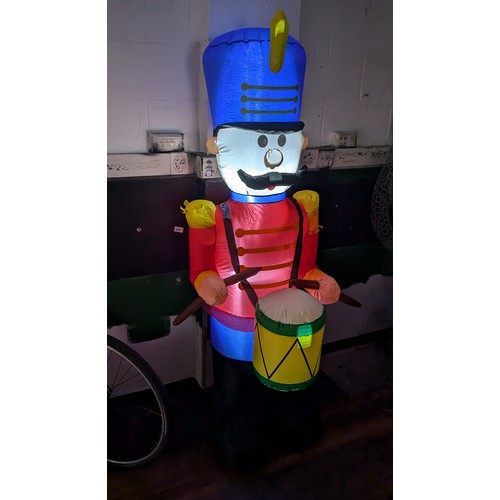 3 - Approximately 6 ft tall clear static light up, indoor or outdoor inflatable little drummer boy