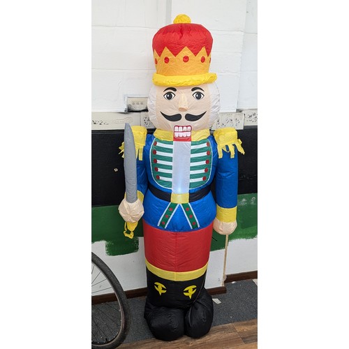 4 - Approximately 6 ft tall clear static light up, indoor or outdoor inflatable Christmas nutcracker