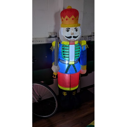 4 - Approximately 6 ft tall clear static light up, indoor or outdoor inflatable Christmas nutcracker