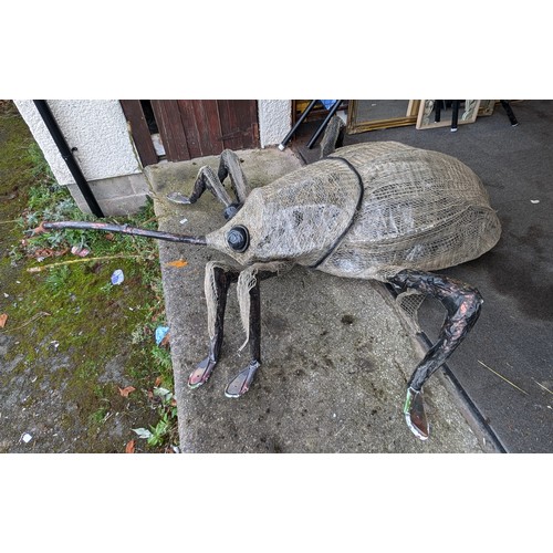 10 - Approximately 9 ft long 'Acorn Weevil' made from mixed repurposed and sustainable materials - all pr... 