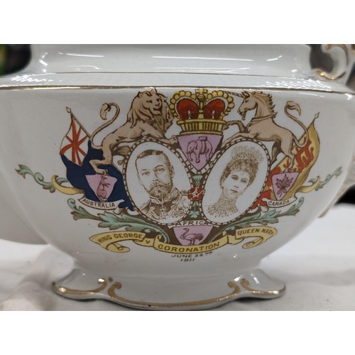 1057 - 1911 King George V coronation teapot (damage on spout) and mug (hairline crack)