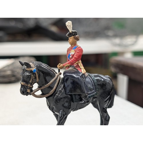 249 - Vintage Britains Queen on horseback, 2 x guards on horseback and standing colour bearer figures