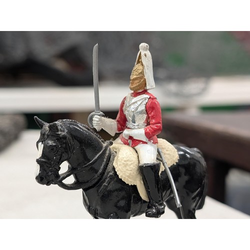 249 - Vintage Britains Queen on horseback, 2 x guards on horseback and standing colour bearer figures