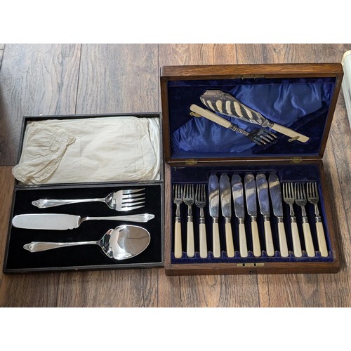 92 - Wooden cased fish knife, fork and serving set plus other cased 3 piece serving set