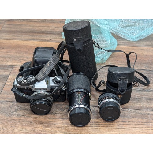 452 - Olympus OH10 35mm camera and 2 x Hoya lenses being 28mm and 80-205mm in cases