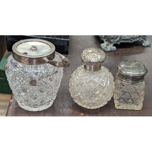 154 - 3 x Early 1900's cut glass bottles/pots with hallmarked silver tops