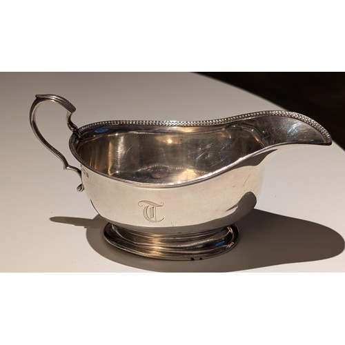 234 - Hallmarked silver gravy/sauce boat with engraved T initial, 1929 Adie Brothers Birmingham - 107 gm