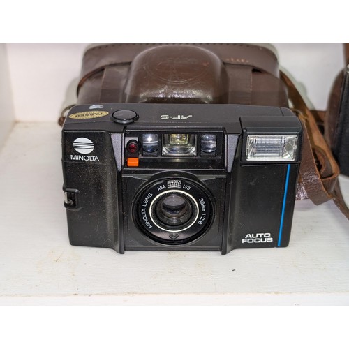 73 - Trio of vintage cameras in cases being Minolta AF-S (in old Ilford case), Kodak folding and Zeiss Ik... 