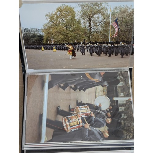 35 - Small photograph album of developed photographs of The Queen and state visit parade in November 1993... 