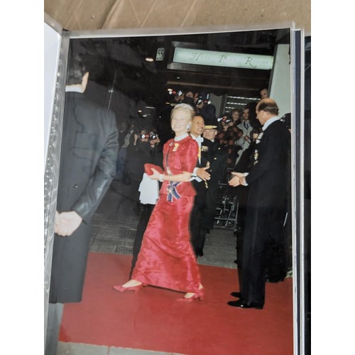 35 - Small photograph album of developed photographs of The Queen and state visit parade in November 1993... 