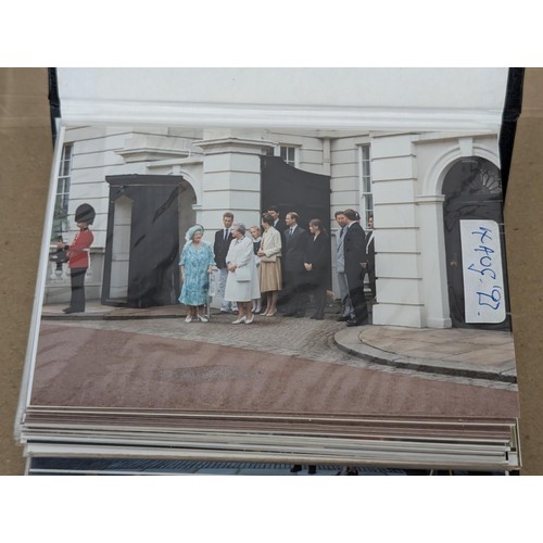 36 - Small photograph album full of developed photographs of The Queen Mother at various visits, from Aug... 