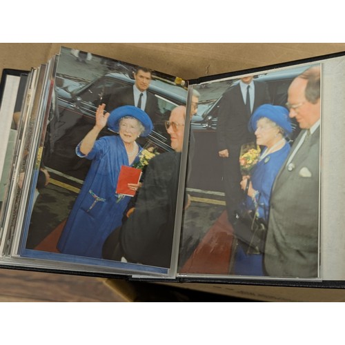 36 - Small photograph album full of developed photographs of The Queen Mother at various visits, from Aug... 