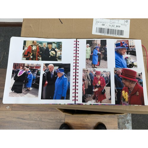 38 - Large photograph album full of developed photographs of most of the Royal family over a number of ye... 