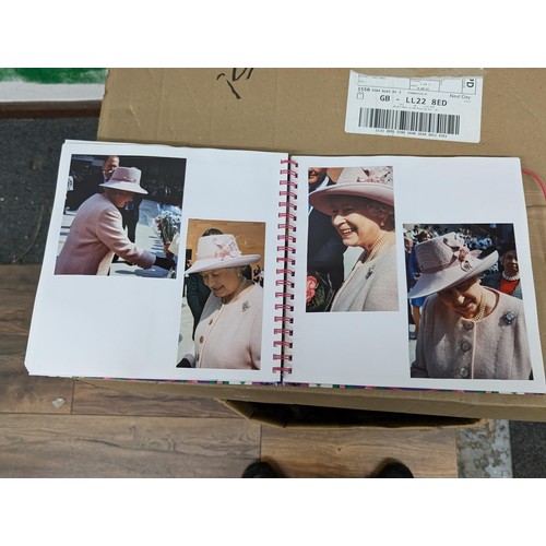 38 - Large photograph album full of developed photographs of most of the Royal family over a number of ye... 