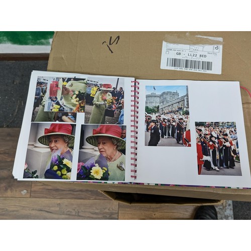 38 - Large photograph album full of developed photographs of most of the Royal family over a number of ye... 