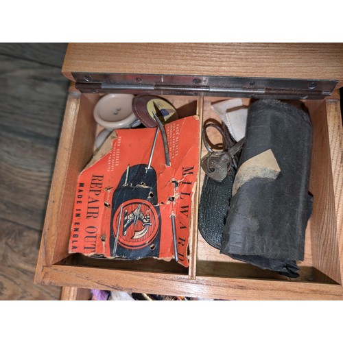 33 - Mid-century wooden cantilever sewing box and contents