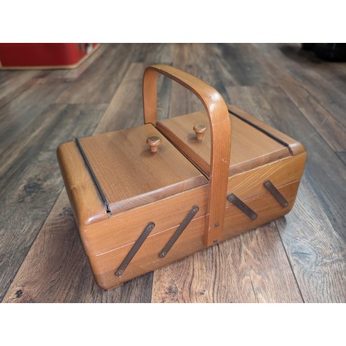 33 - Mid-century wooden cantilever sewing box and contents