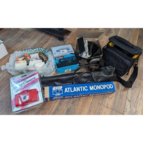 45 - Bundle of vintage and retro cameras and equipment including 2 x boxed cameras, monopod and tripod et... 