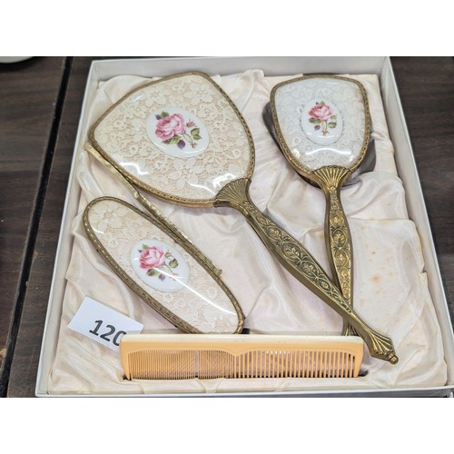 120 - Boxed gilt and lace ladies vanity set - comb missing a tooth