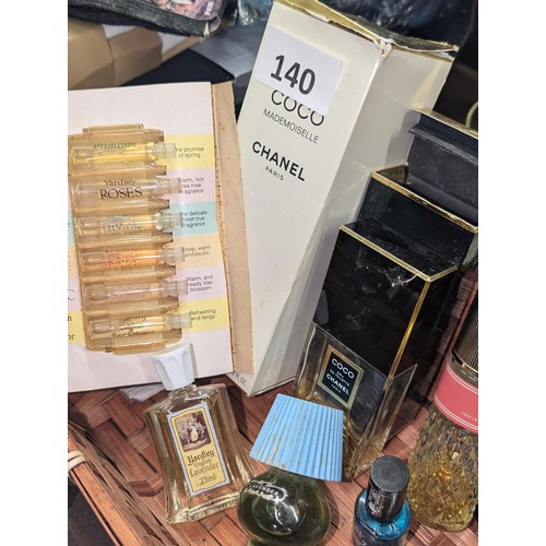 140 - Basket of assorted mostly vintage perfumes with varying amounts left