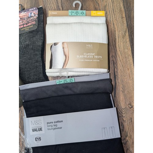 143 - Bundle of assorted new gents clothes and socks including still tagged M&S luxury pure new wool suit ... 