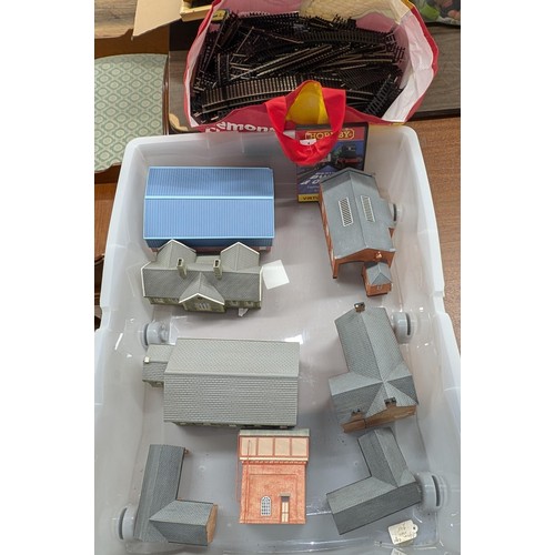 266 - Bundle of solid (not cardboard) model railway buildings and large bag of HO/00 gauge track