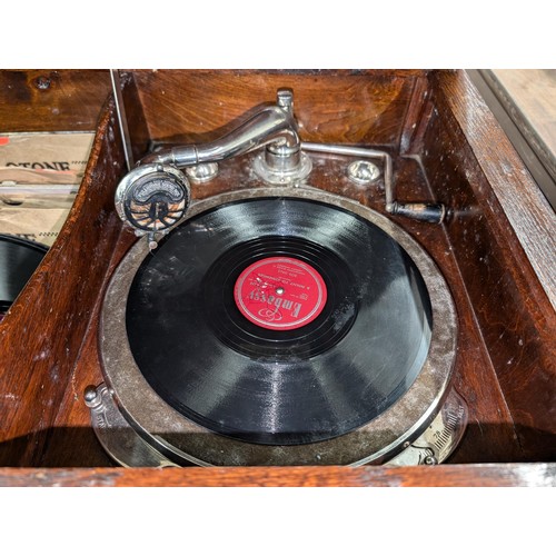 232 - 1920/30s Fullotone sound box wind up record player in Oak cabinet with assorted 78s and long play re... 