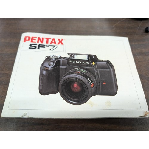 197 - Pentax SF7 camera with 28-80mm lens and manual, no charger so untested and sold A/F