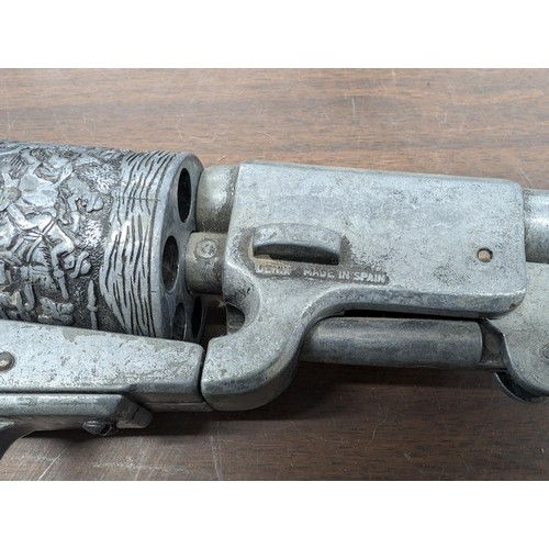 361 - Detailed replica pewter 1849 Colt Dragoon revolver with wooden grip and decorative engraving.