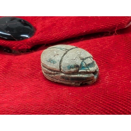 360 - Pair of carved Ancient Egyptian scarab beetles with note stating from the tomb of Thebes and from th... 