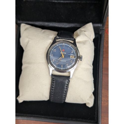 429 - Working vintage Roamer manual wind Vanguard calendar watch in box with leather strap