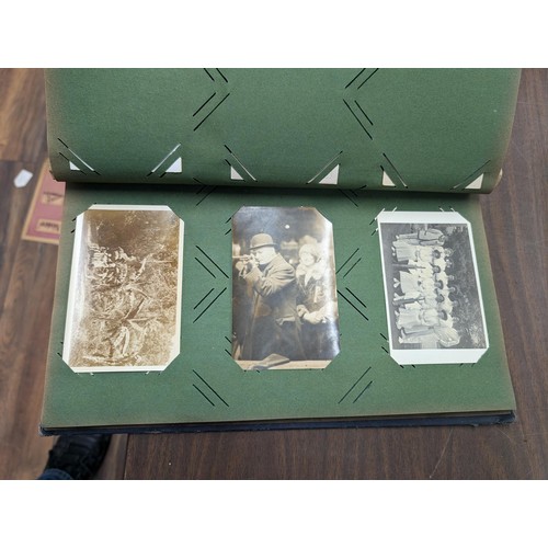 10 - Slightly distressed vintage album of photographic postcards dating 1914-1919