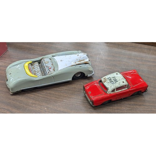 397 - 2 x 1950/60s Vintage tin plate friction cars