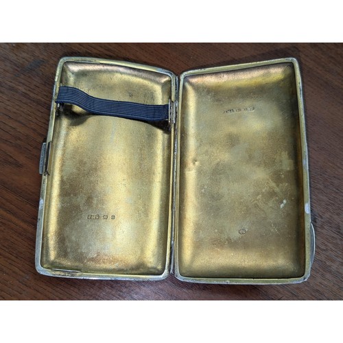 347 - Large hallmarked silver with gilded inner cigarette case, couple of dents and engraved name on front... 