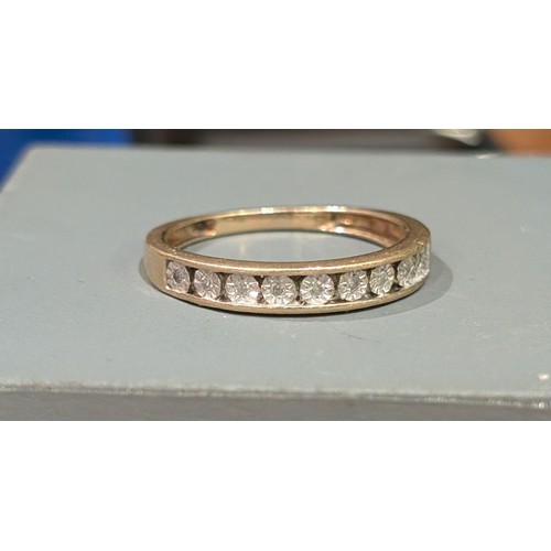 445 - hallmarked 9 carat gold and CZ 7 stone band ring size N -  1.7 gm