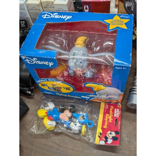 271 - Boxed and unused Disney flying Dumbo & still sealed vintage Mickey Mouse flashlight keyring