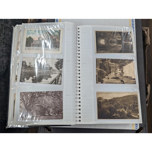 184 - Postcard album with 300 x mainly black and white mixed postcards - unposted dating early 1900s upwar... 