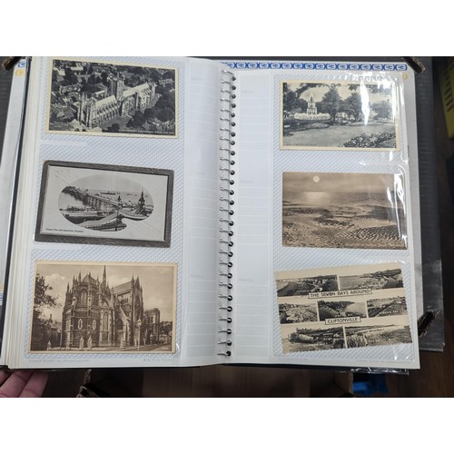 184 - Postcard album with 300 x mainly black and white mixed postcards - unposted dating early 1900s upwar... 