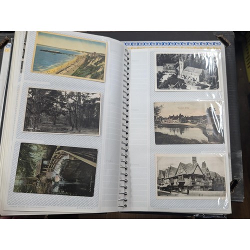 184 - Postcard album with 300 x mainly black and white mixed postcards - unposted dating early 1900s upwar... 