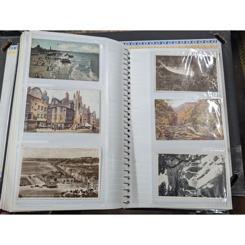 184 - Postcard album with 300 x mainly black and white mixed postcards - unposted dating early 1900s upwar... 