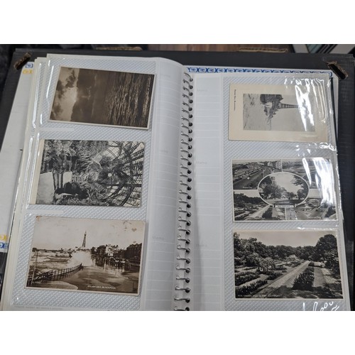 184 - Postcard album with 300 x mainly black and white mixed postcards - unposted dating early 1900s upwar... 