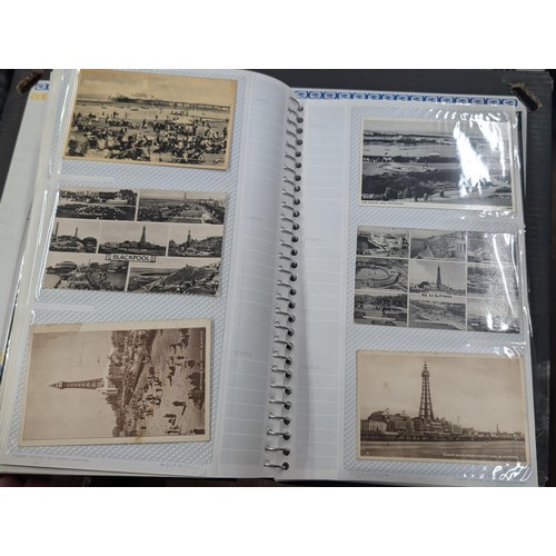 184 - Postcard album with 300 x mainly black and white mixed postcards - unposted dating early 1900s upwar... 