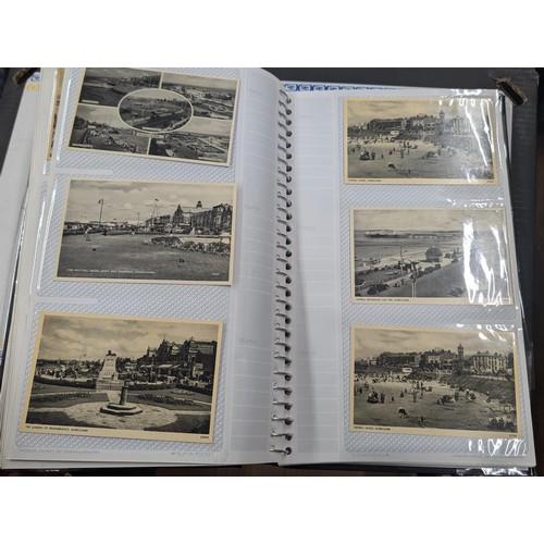 184 - Postcard album with 300 x mainly black and white mixed postcards - unposted dating early 1900s upwar... 